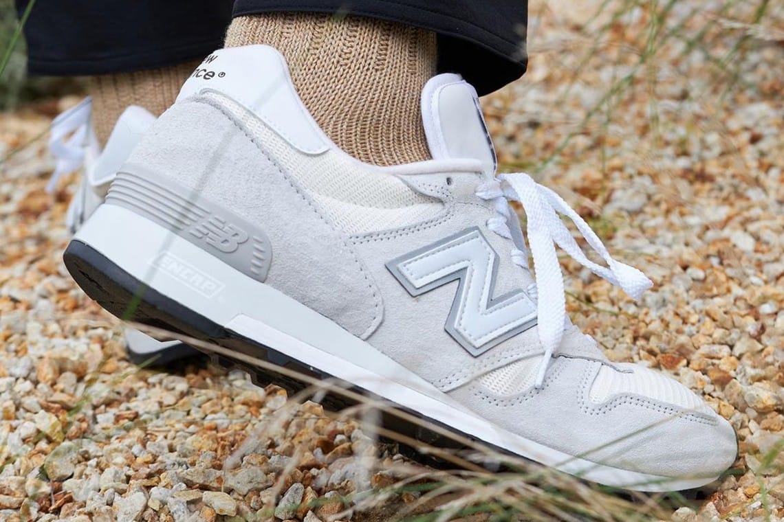 gray and white new balance shoes