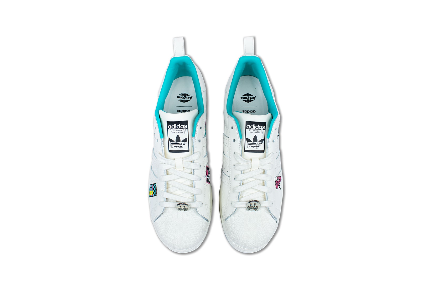 adidas originals arizona iced tea superstar collaboration sneakers big cans aerial birds eye view white laces teal blue insole black