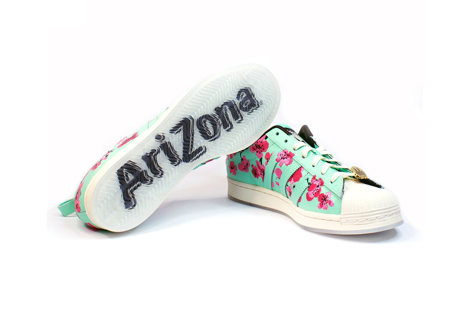 adidas originals arizona iced tea superstar collaboration sneakers big cans sole teal blue pink flowers white laces gold