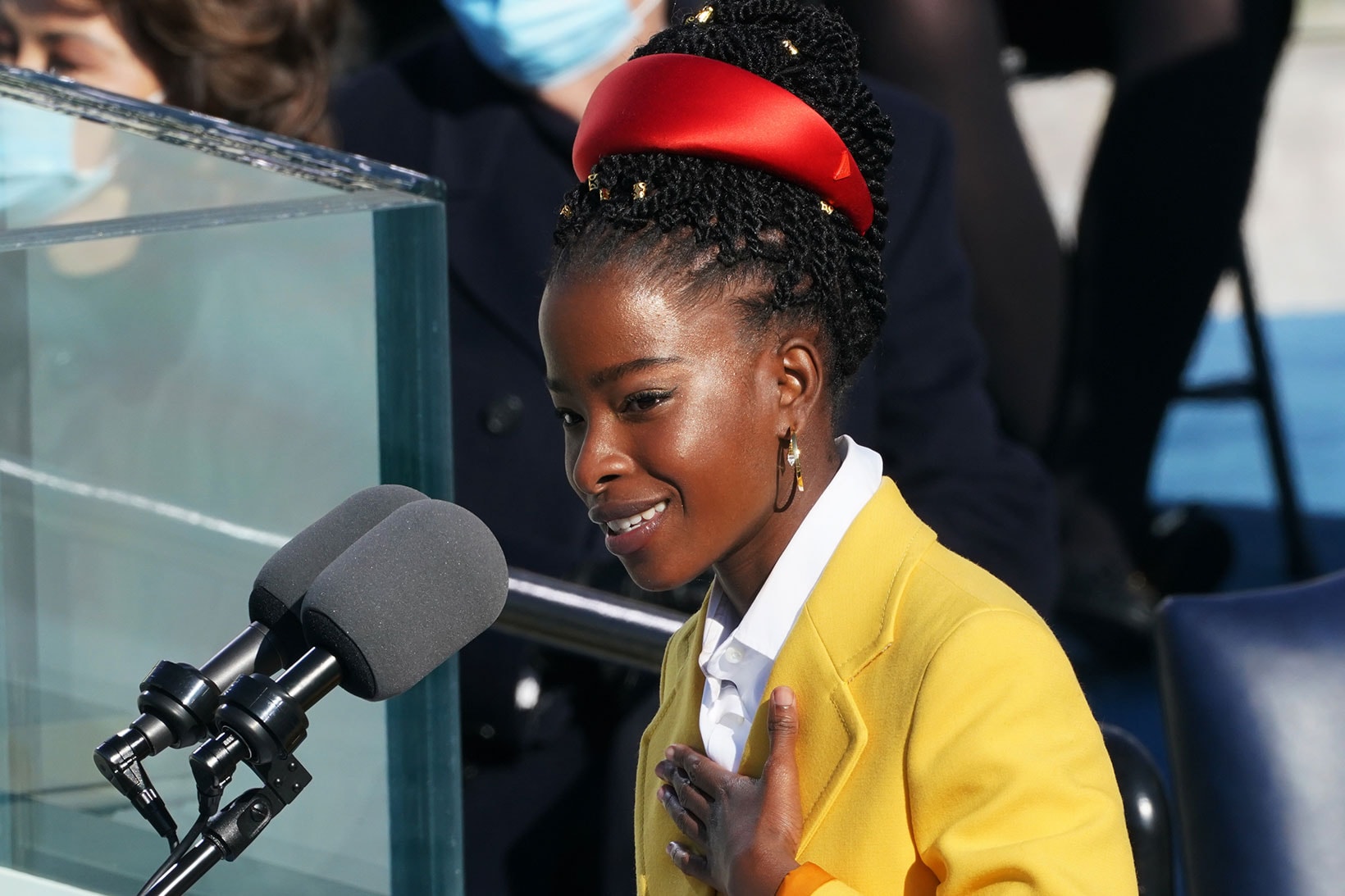 amanda gorman president inauguration youth poet laureate youngest 22 year old outfit red hairband yellow coat prada