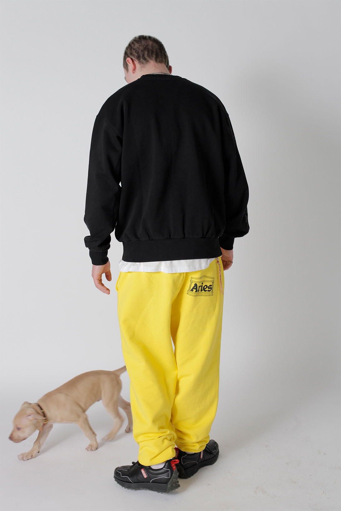 aries spring summer ss21 collection lookbook black sweatshirt yellow sweatpants dog puppy