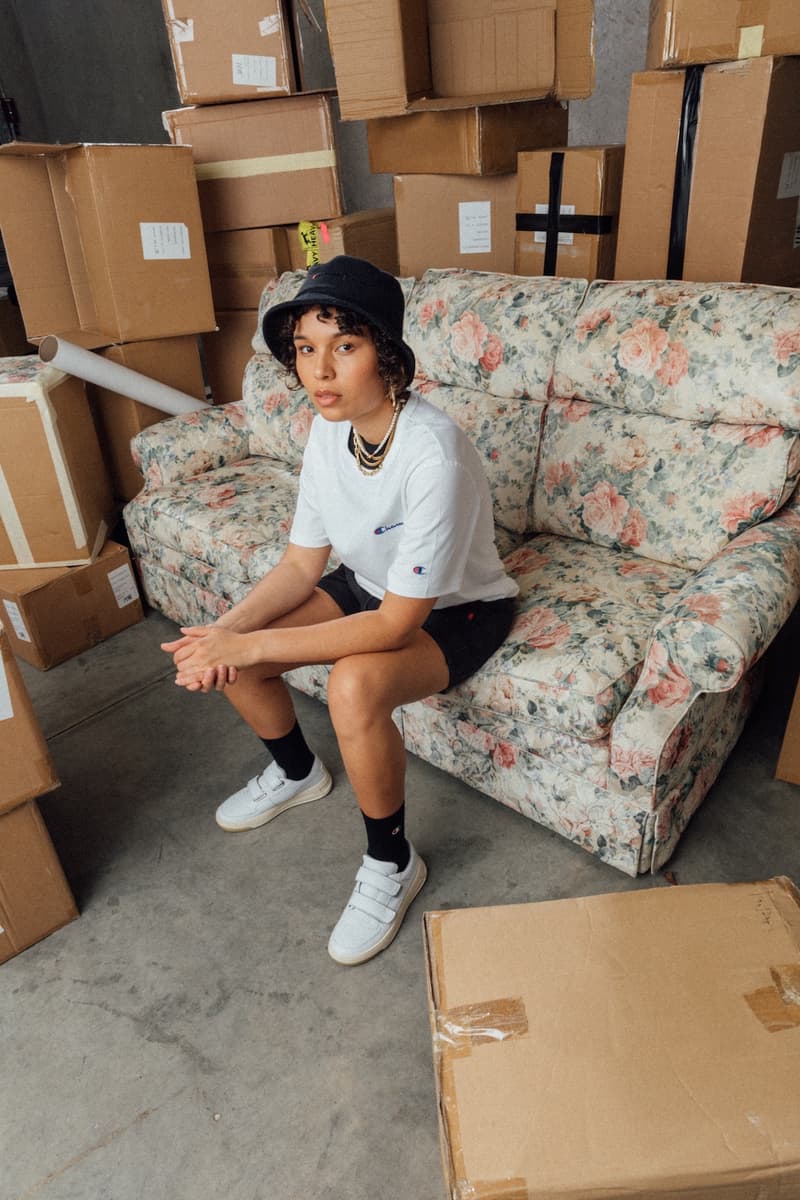 champion sustainable rebound washed black collection drop 2 bucket hat white tee shirt bike shorts sneakers sofa boxes