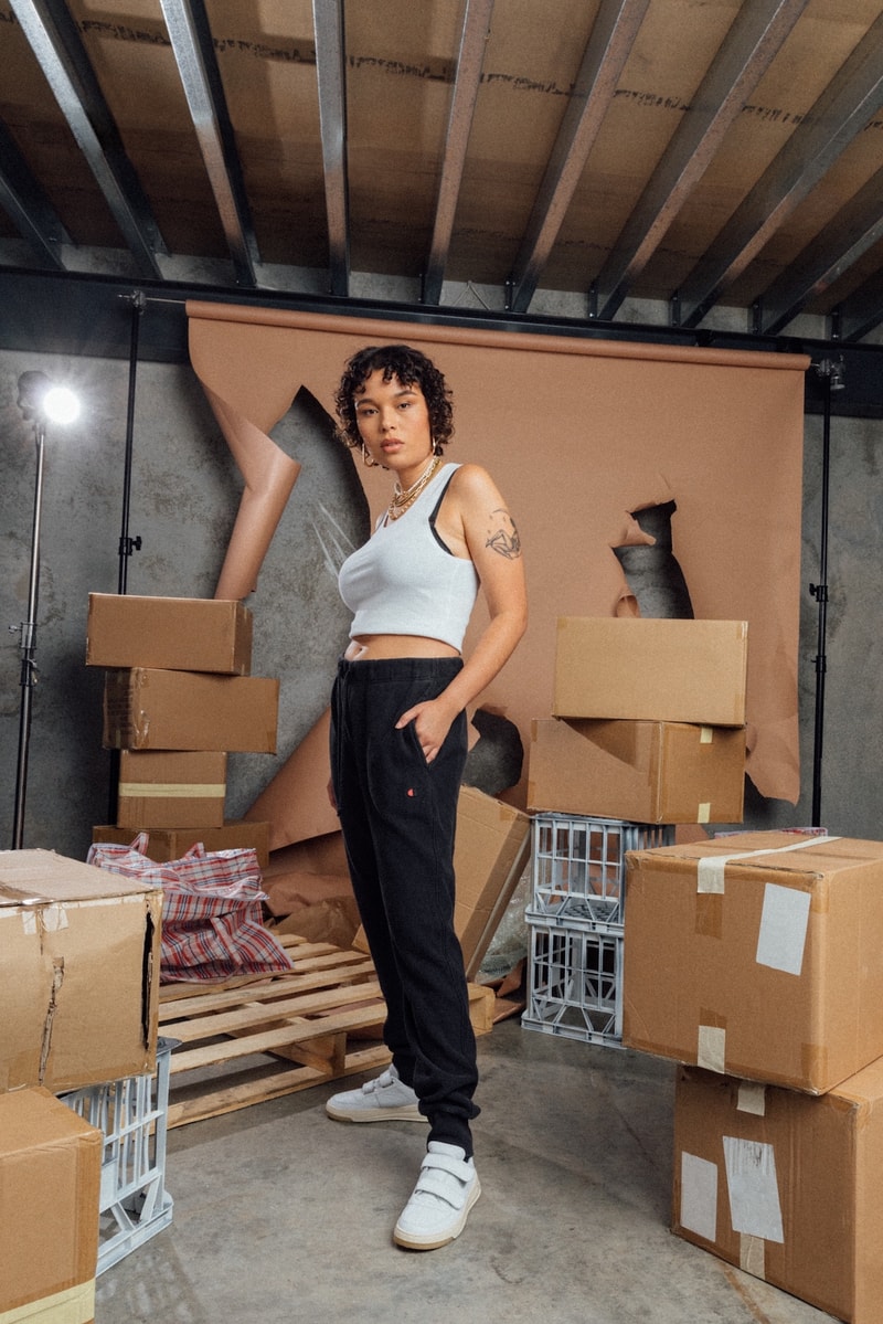 champion sustainable rebound washed black collection drop 2 white tank top pants sneakers boxes sofa
