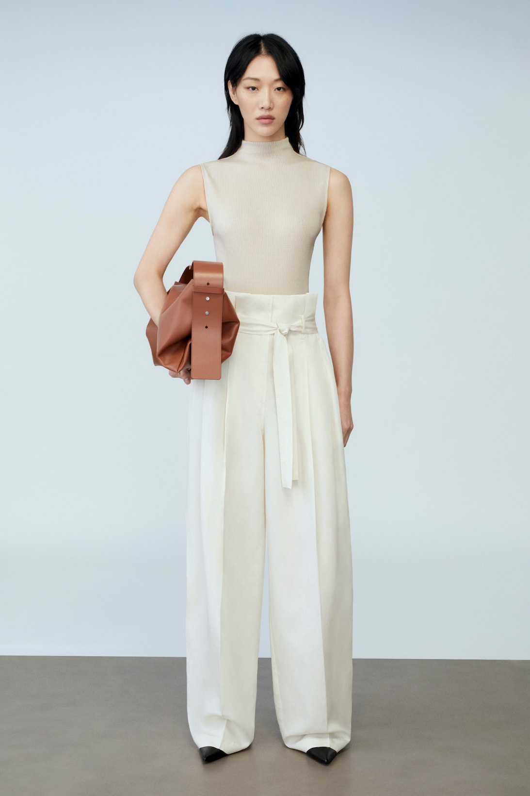 sora choi cos spring womenswear summer collection lookbook beige turtle neck top white pants black shoes heels brown bag