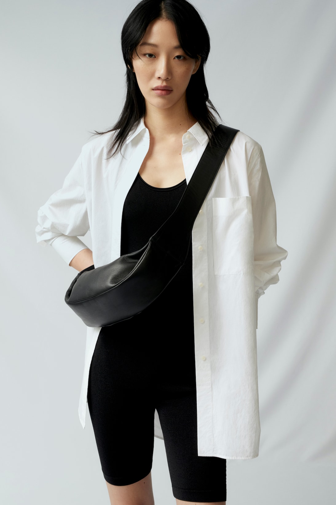 sora choi cos spring womenswear summer collection lookbook white oversized shirt black jumpsuit belt bag