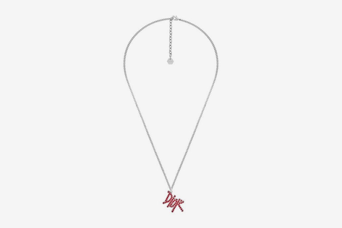 dior shawn stussy chinese lunar new year ox capsule collection pendant necklace silver red crystals