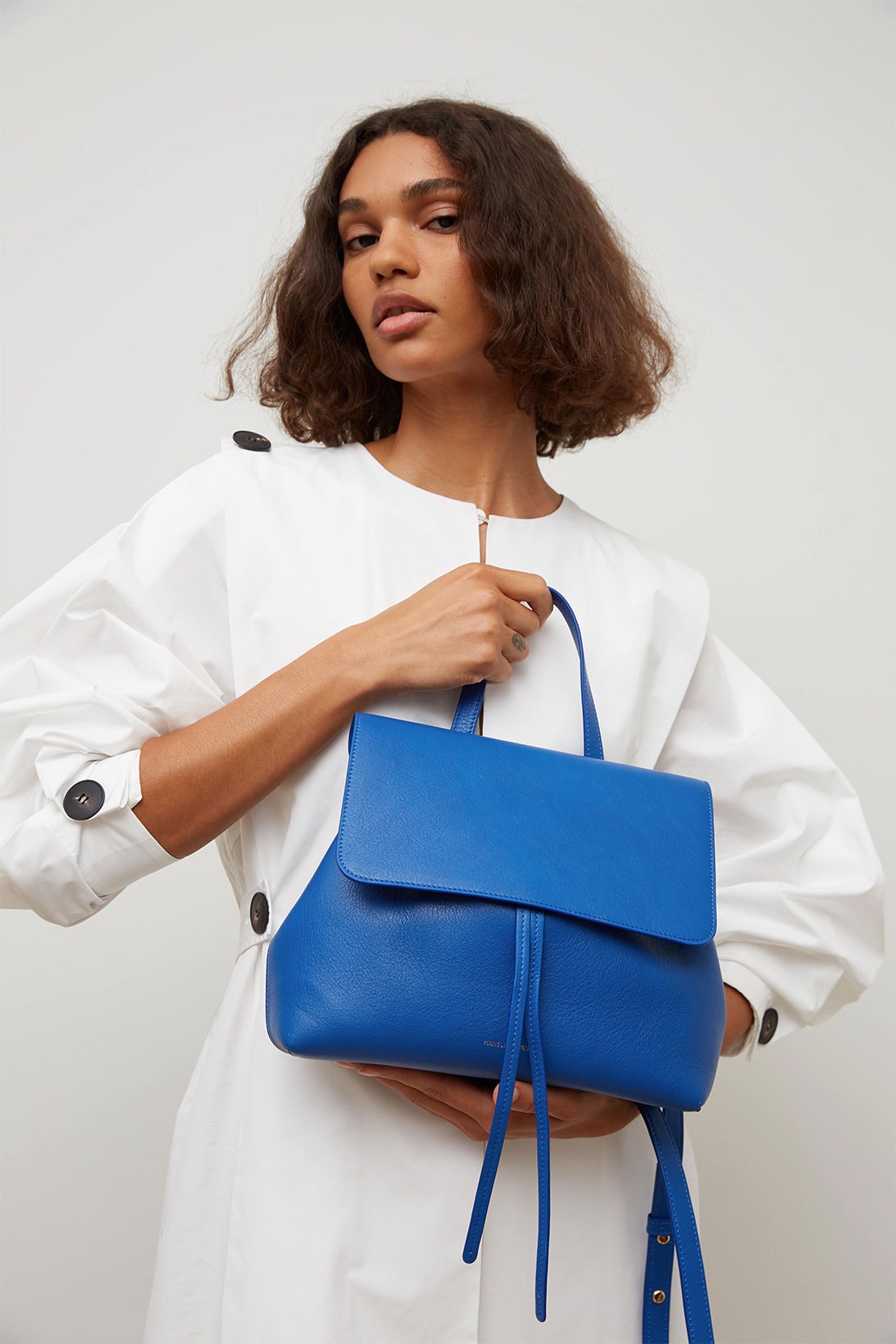 mansur gavriel soft lady handbag calfskin leather blue white dress model shot