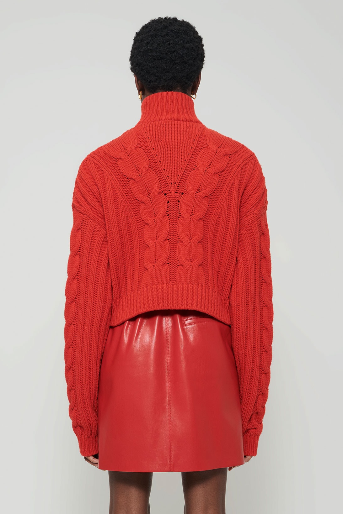 nanushka all-red chinese lunar new year collection chunky cable knitwear sweater vegan leather mini skirt