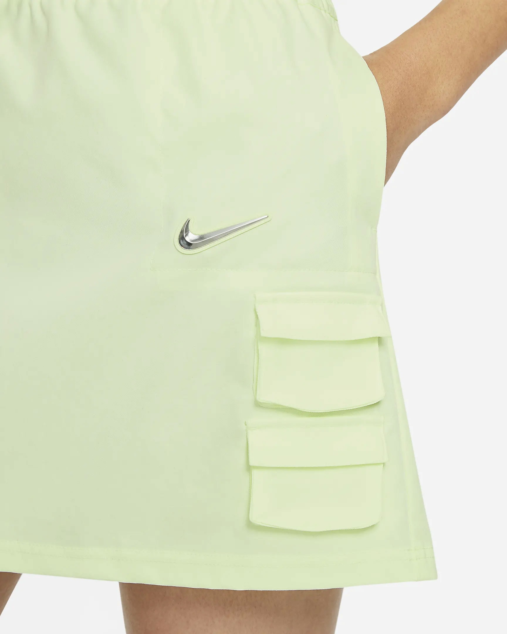 nike sportswear swoosh logo skirt barely volt spring summer outfit details closeup mini pockets