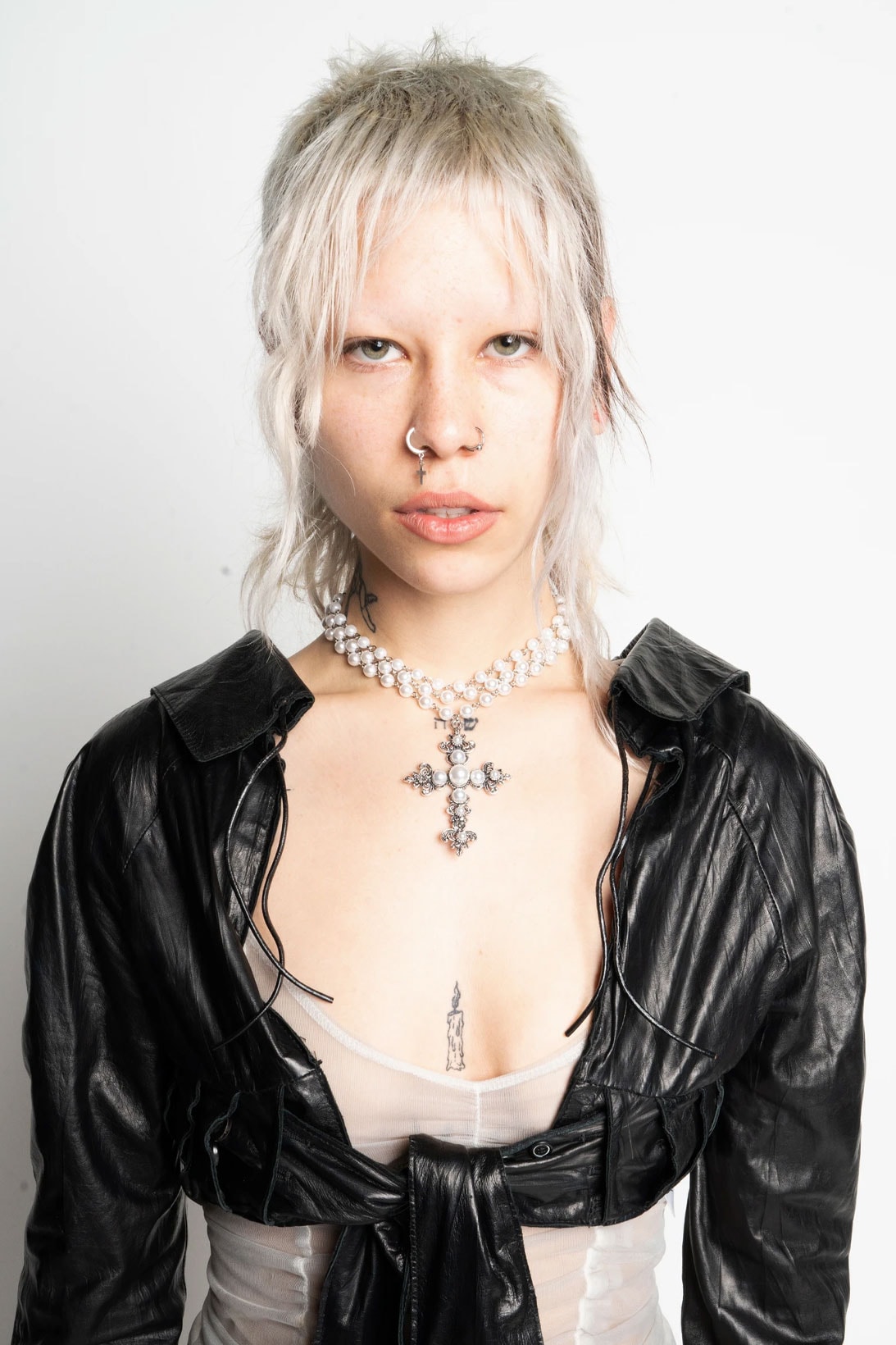 ohtnyc rising new york designer jinsol woo piercing cross chain necklace tank top
