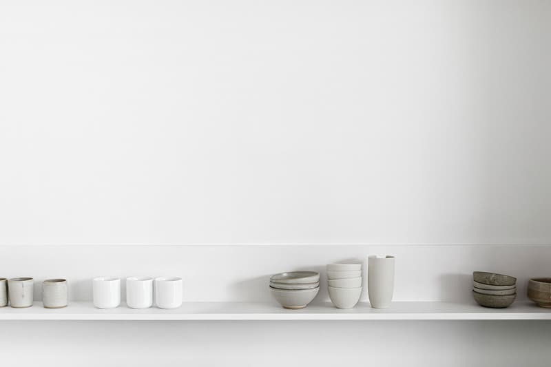 reform norm architects home kitchen interior design collaboration white shelf tableware bowls