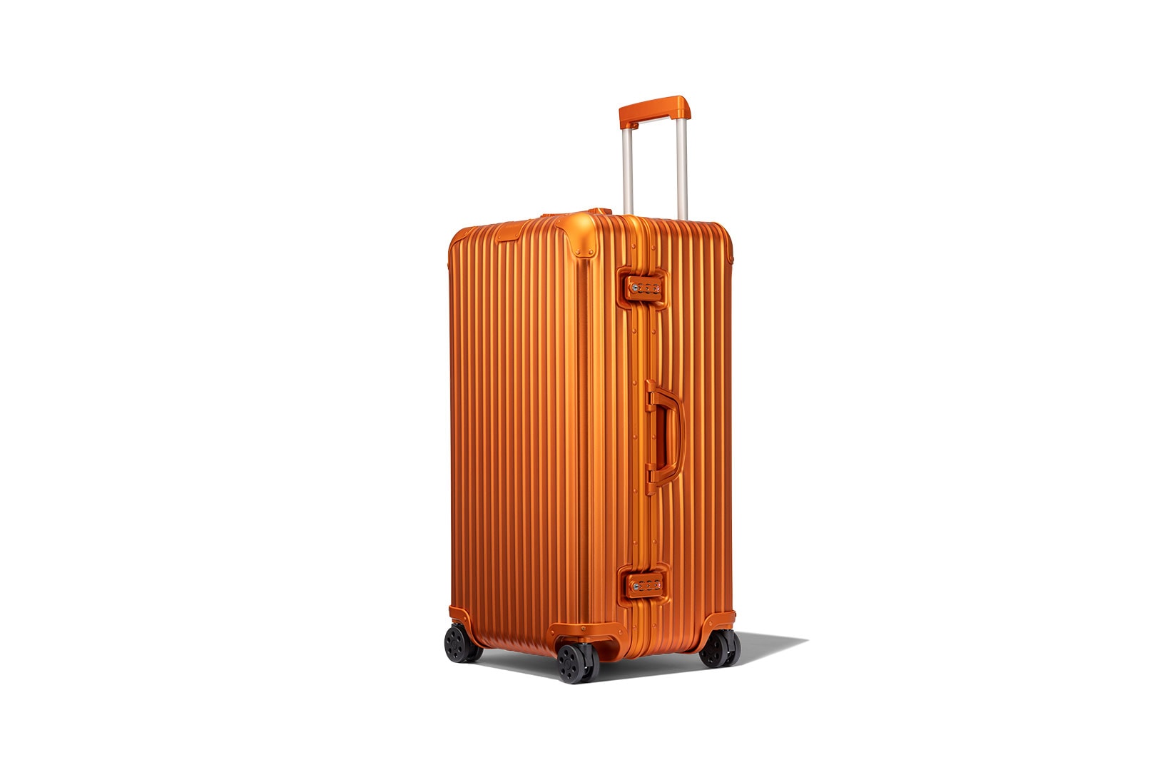 rimowa aluminium original collection new colorways mars orange trunk plus suitcase luggage handle side view