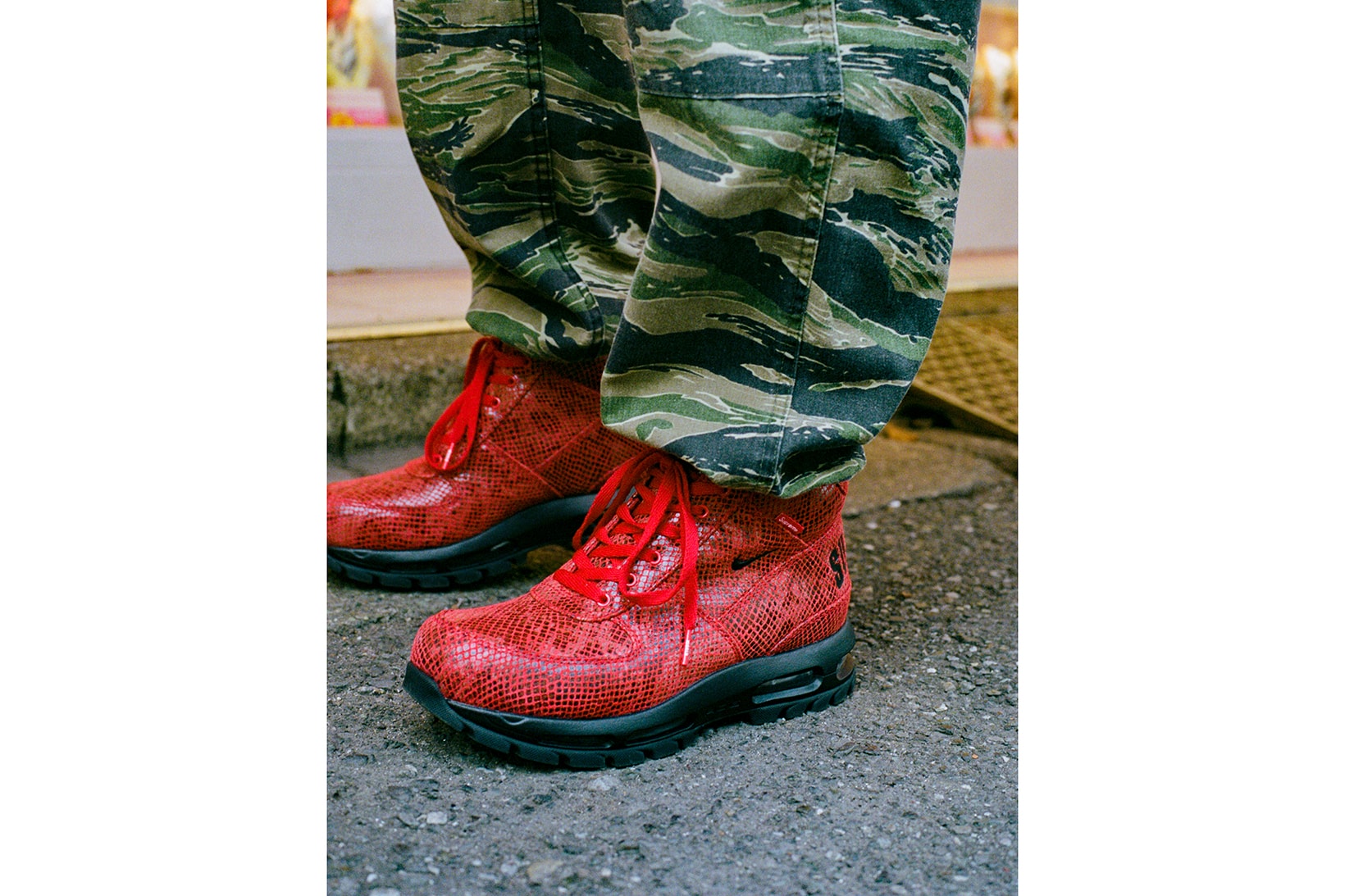 supreme nike goadome collaboration boots footwear shoes snakeskin red colorway camo plants laces