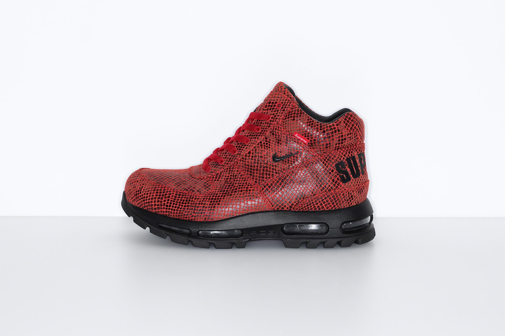 supreme nike goadome collaboration boots footwear shoes snakeskin red colorway black lateral laces