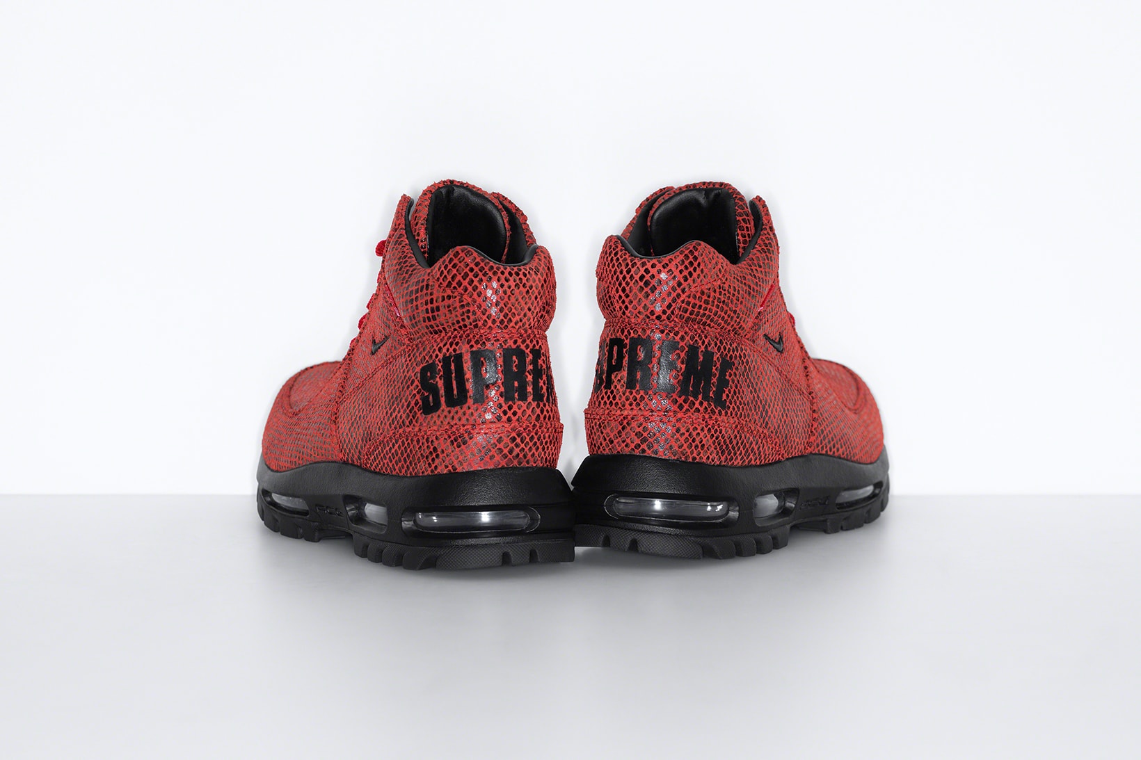 supreme nike goadome collaboration boots footwear shoes snakeskin red colorway black heel