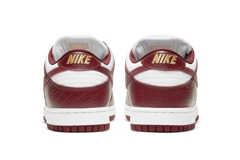 supreme nike sb dunk low collaboration sneakers barkroot brown burgundy red white gold heel