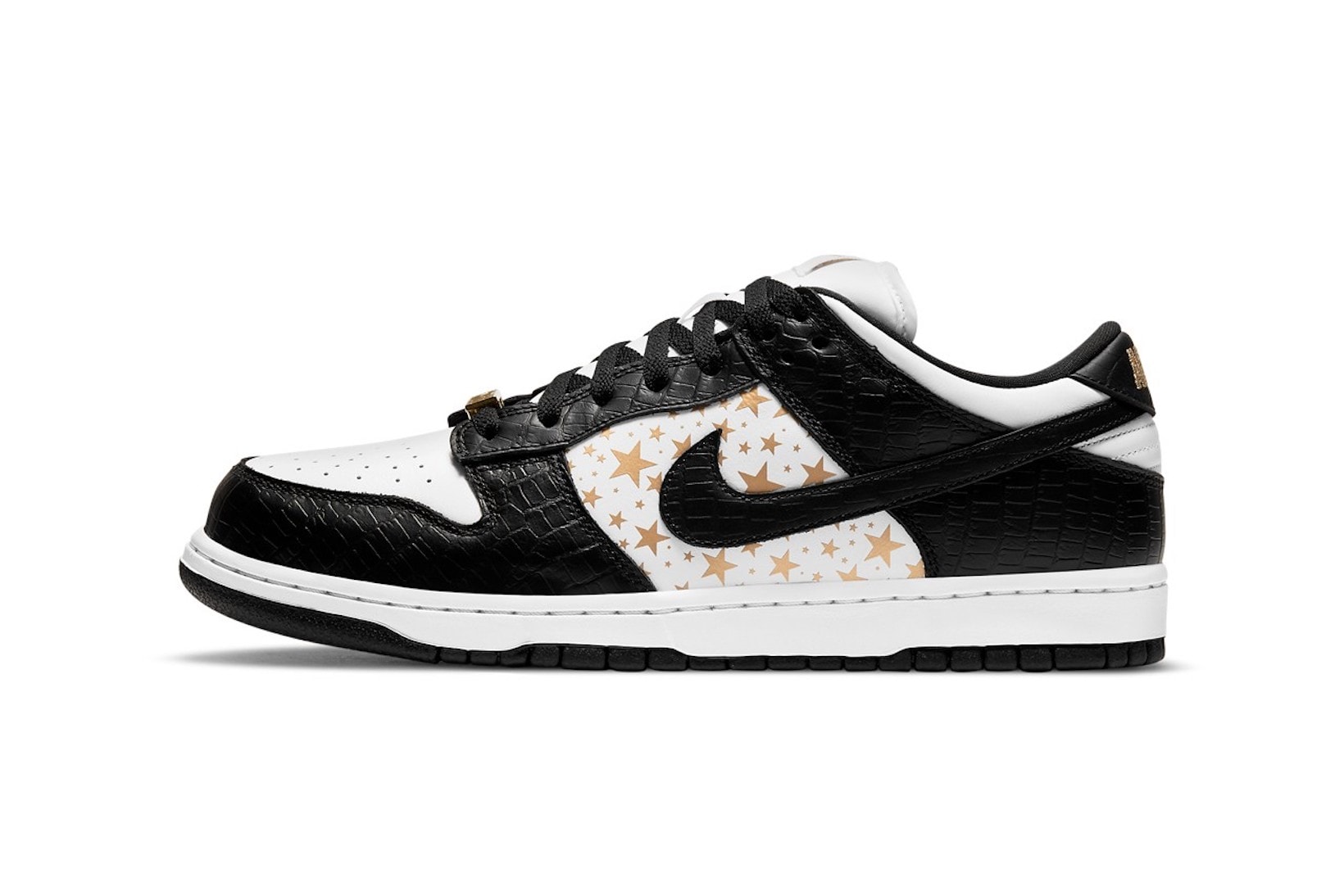 supreme nike sb dunk low collaboration sneakers black white colorway lateral gold stars laces