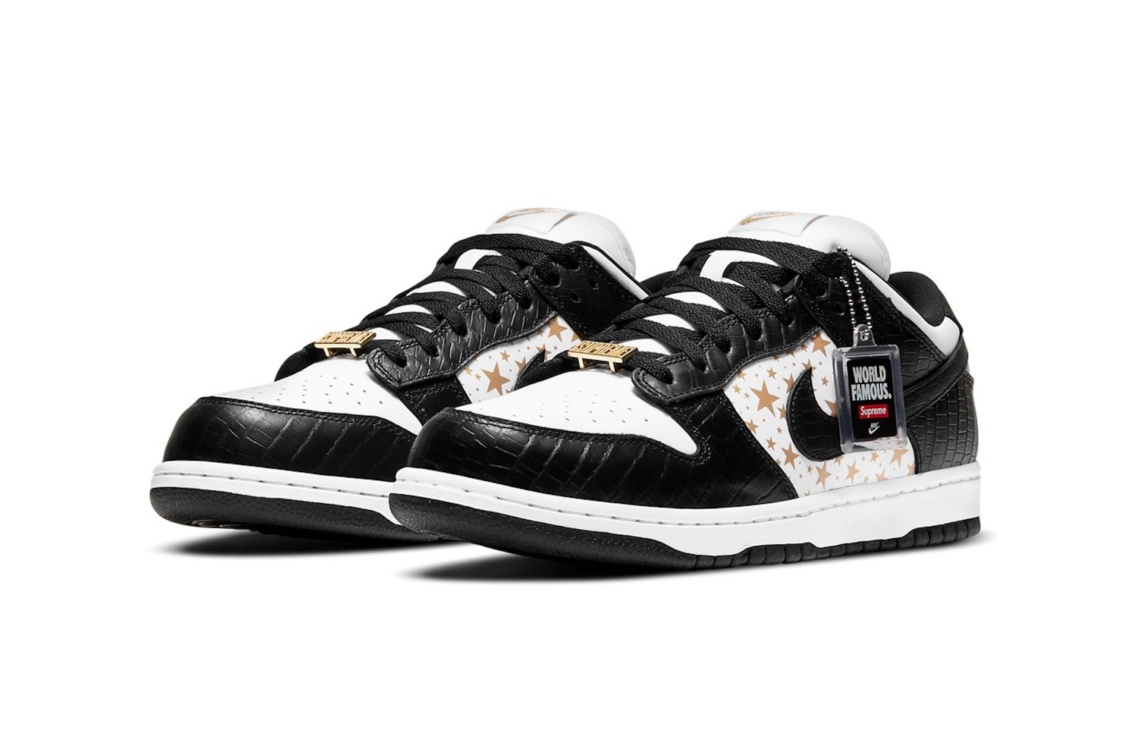 supreme nike sb dunk low collaboration sneakers black white colorway gold stars laces logos tag