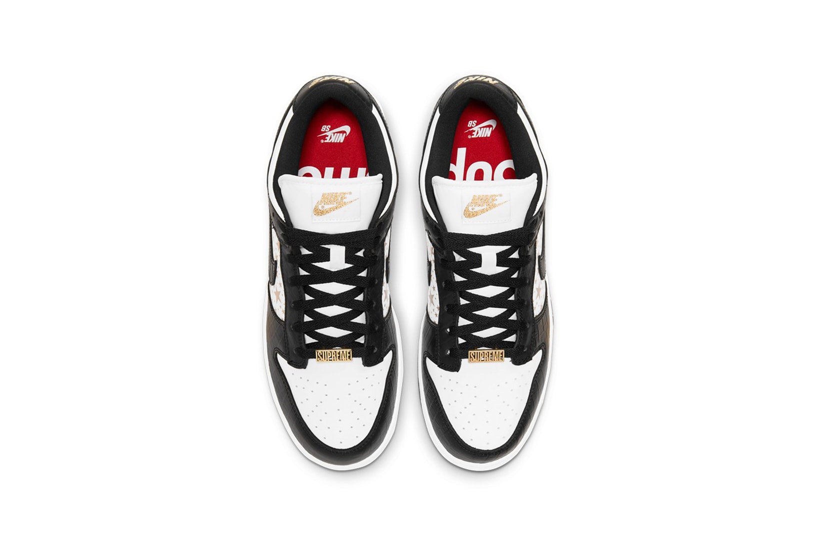 supreme nike sb dunk low collaboration sneakers black white colorway gold stars laces red insole