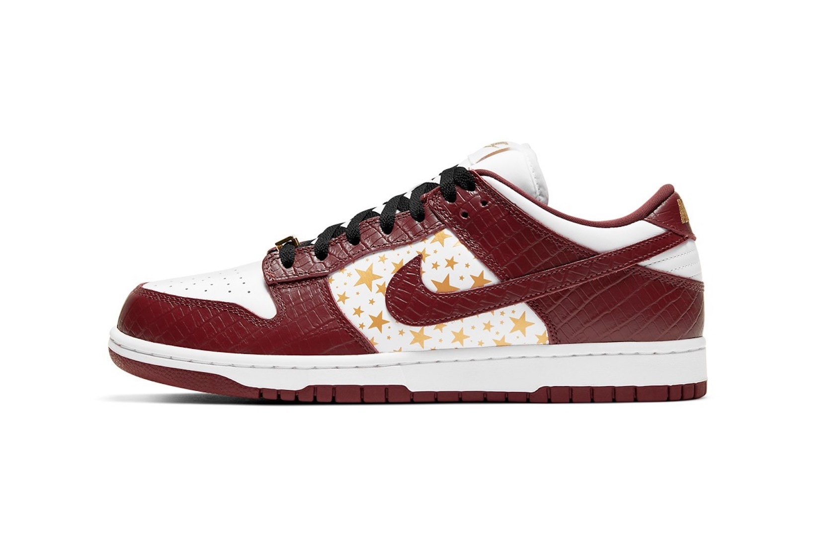 supreme nike sb dunk low collaboration sneakers barkroot brown burgundy red white gold stars lateral black laces