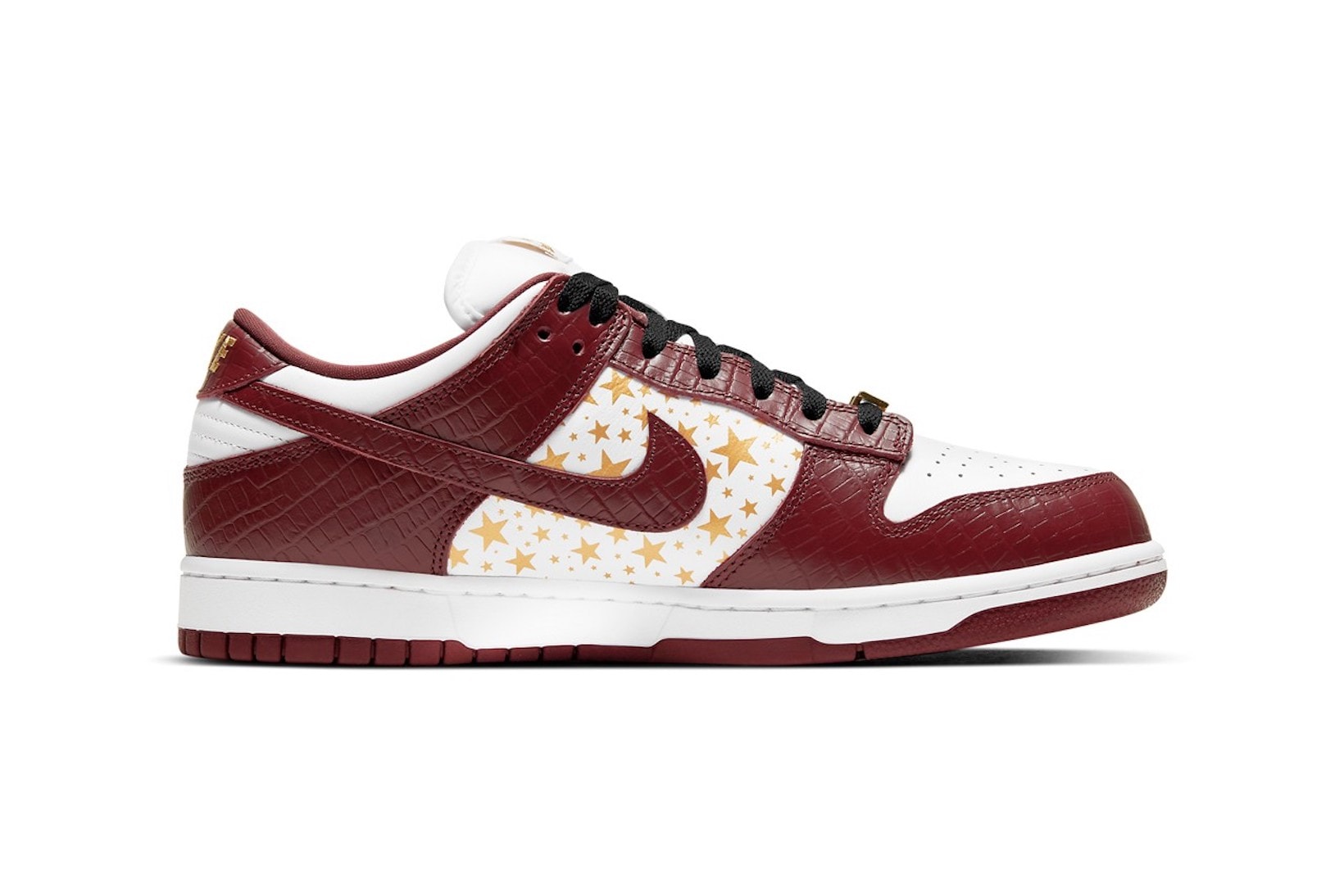 supreme nike sb dunk low collaboration sneakers barkroot brown burgundy red white gold stars lateral black laces