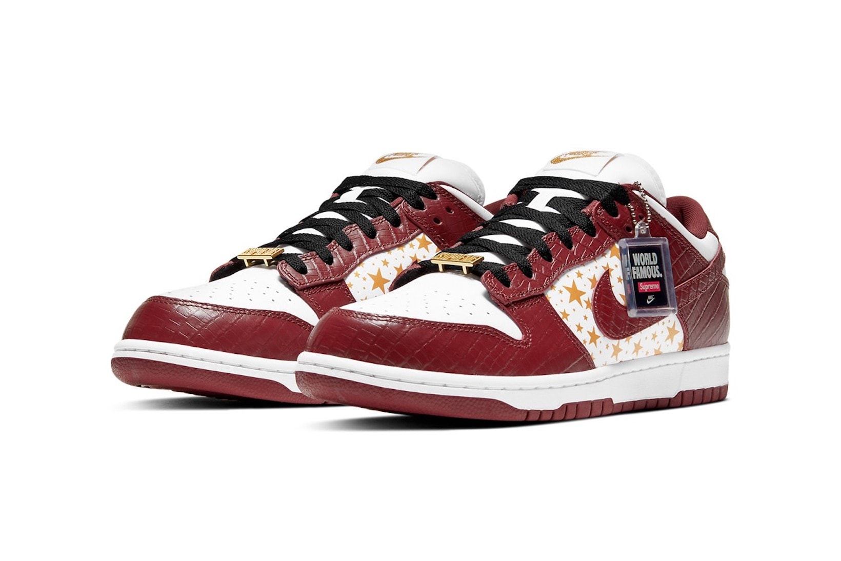 supreme nike sb dunk low collaboration sneakers barkroot brown burgundy red white gold logo stars lateral black laces