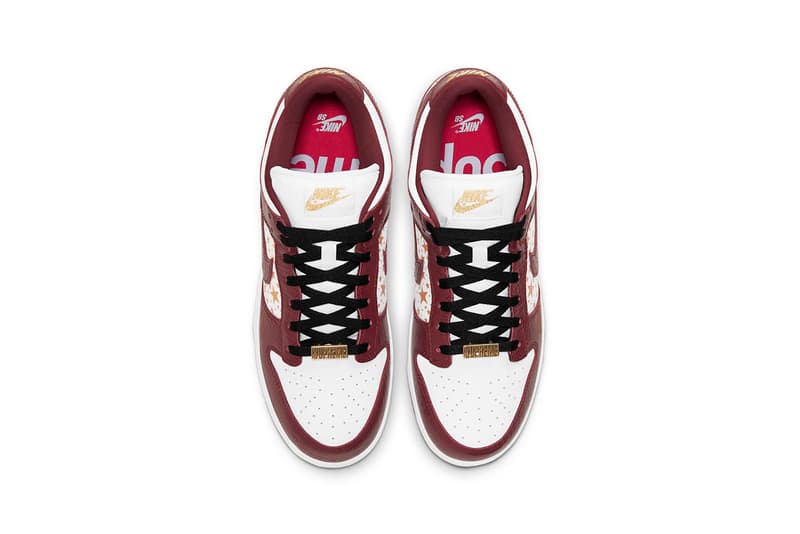 supreme nike sb dunk low collaboration sneakers barkroot brown burgundy red white gold stars black laces insole