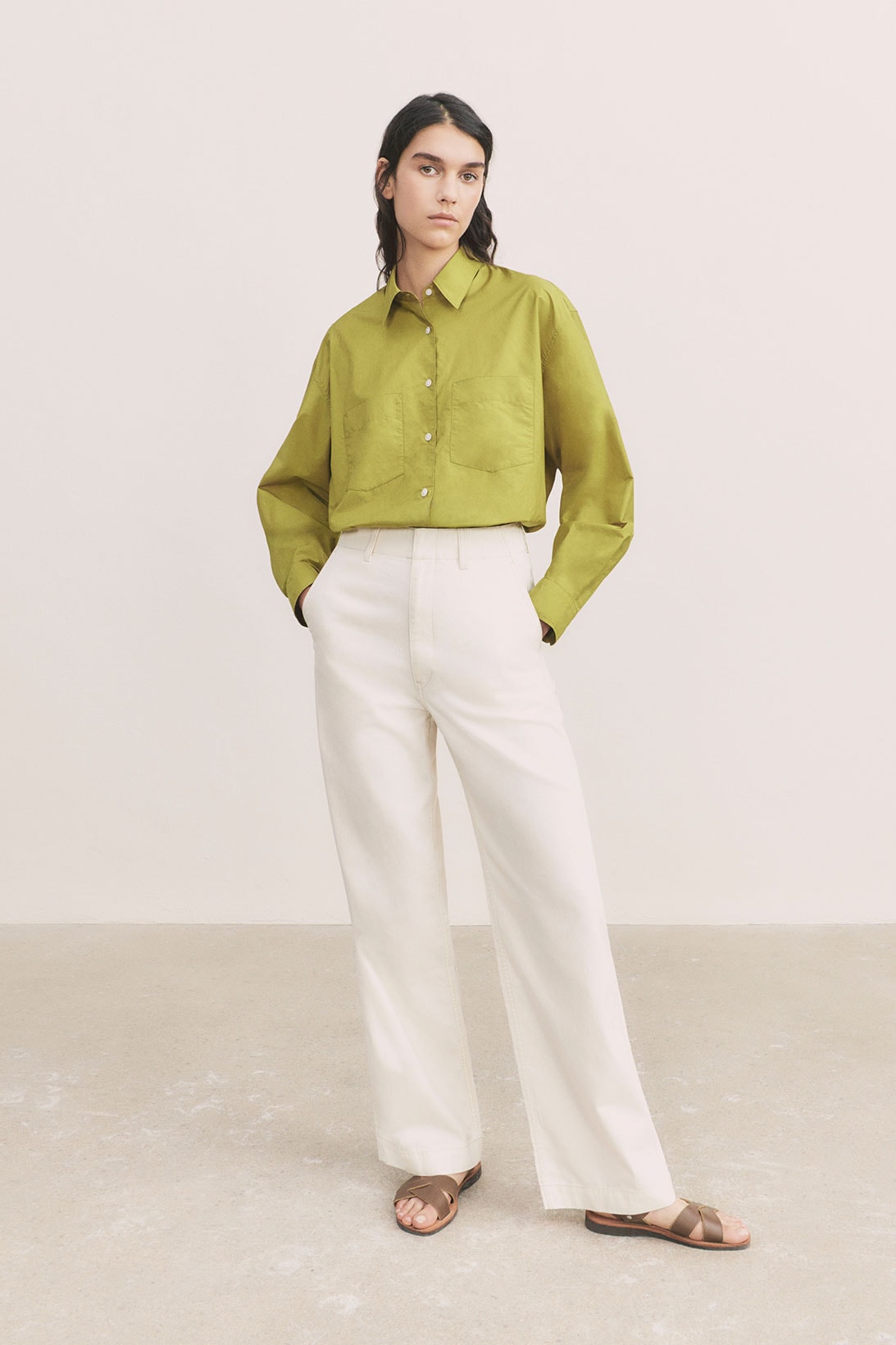 uniqlo u spring summer collection green sweater white pants sandals