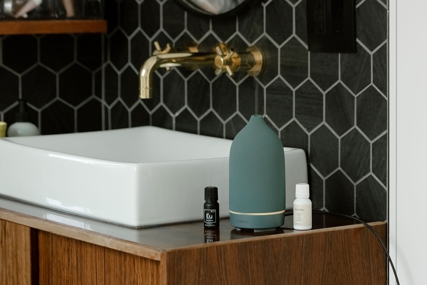 vitruvi stone diffusers essential oils sea teal green homeware decor bathroom sink