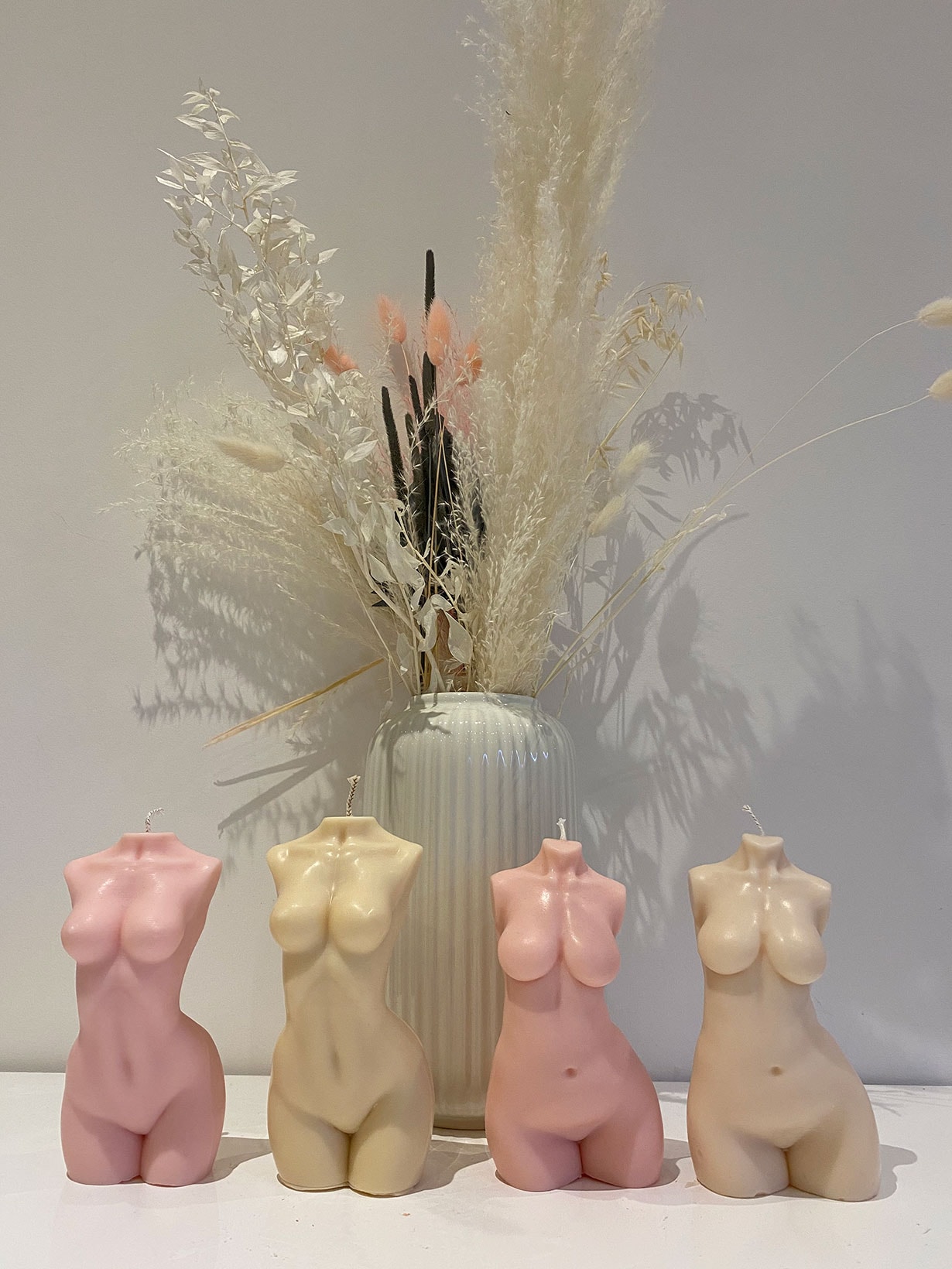 caia nude body torso candles pink flower vase