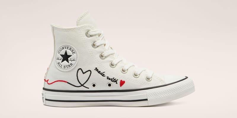 cream converse with heart