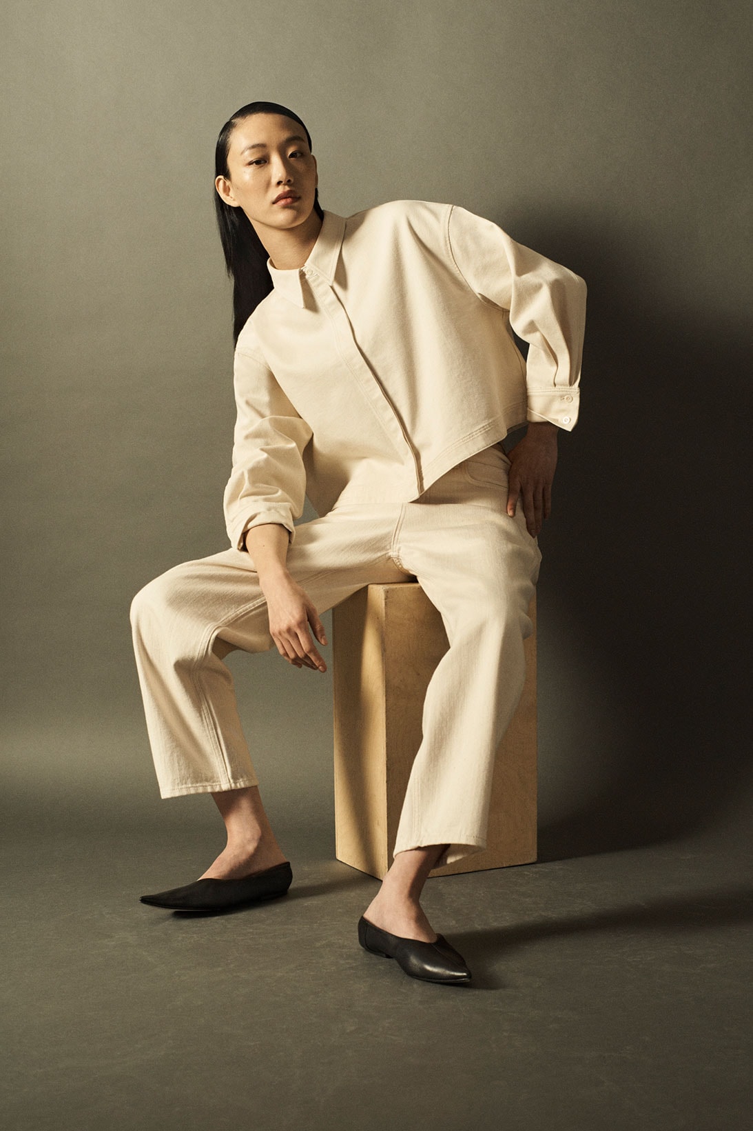 cos spring summer 2021 ss21 sustainable denim collection jeans sora choi shirt flats sitting