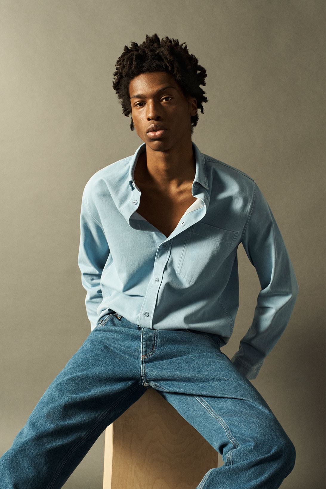 cos spring summer 2021 ss21 sustainable denim collection jeans shirt sitting