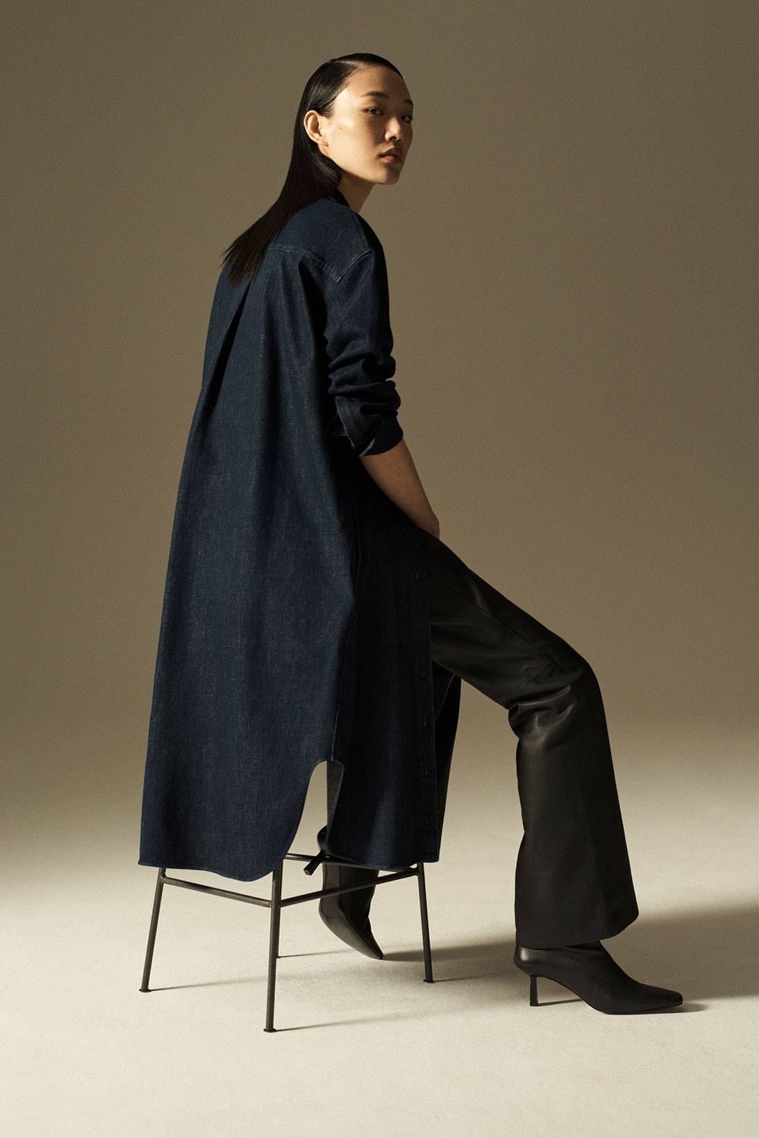 cos spring summer 2021 ss21 sustainable denim collection jeans sora choi shirt boots chair sitting