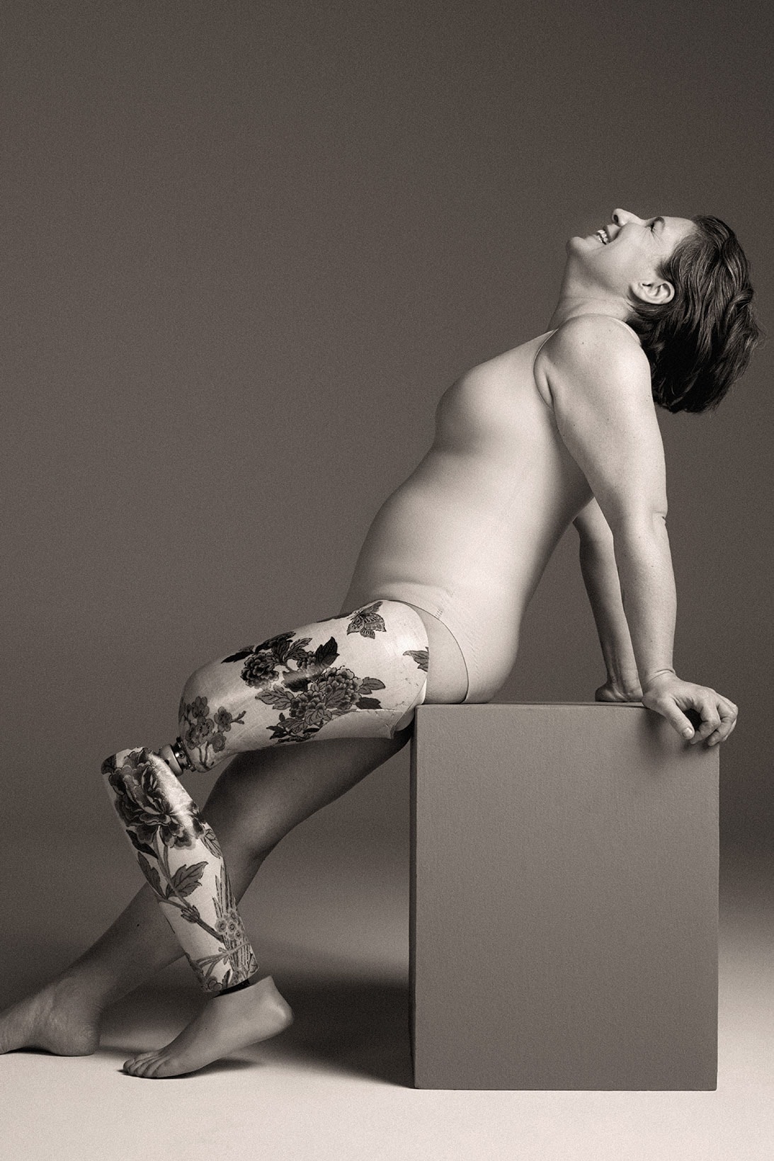 knix love your shapewear underwear campaign prosthetic leg sitting