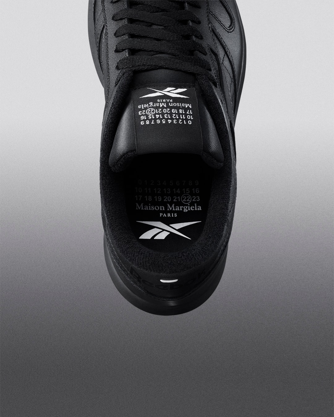 maison margiela reebok classic leather tabi toe sneakers collaboration black details insoles logo tongue