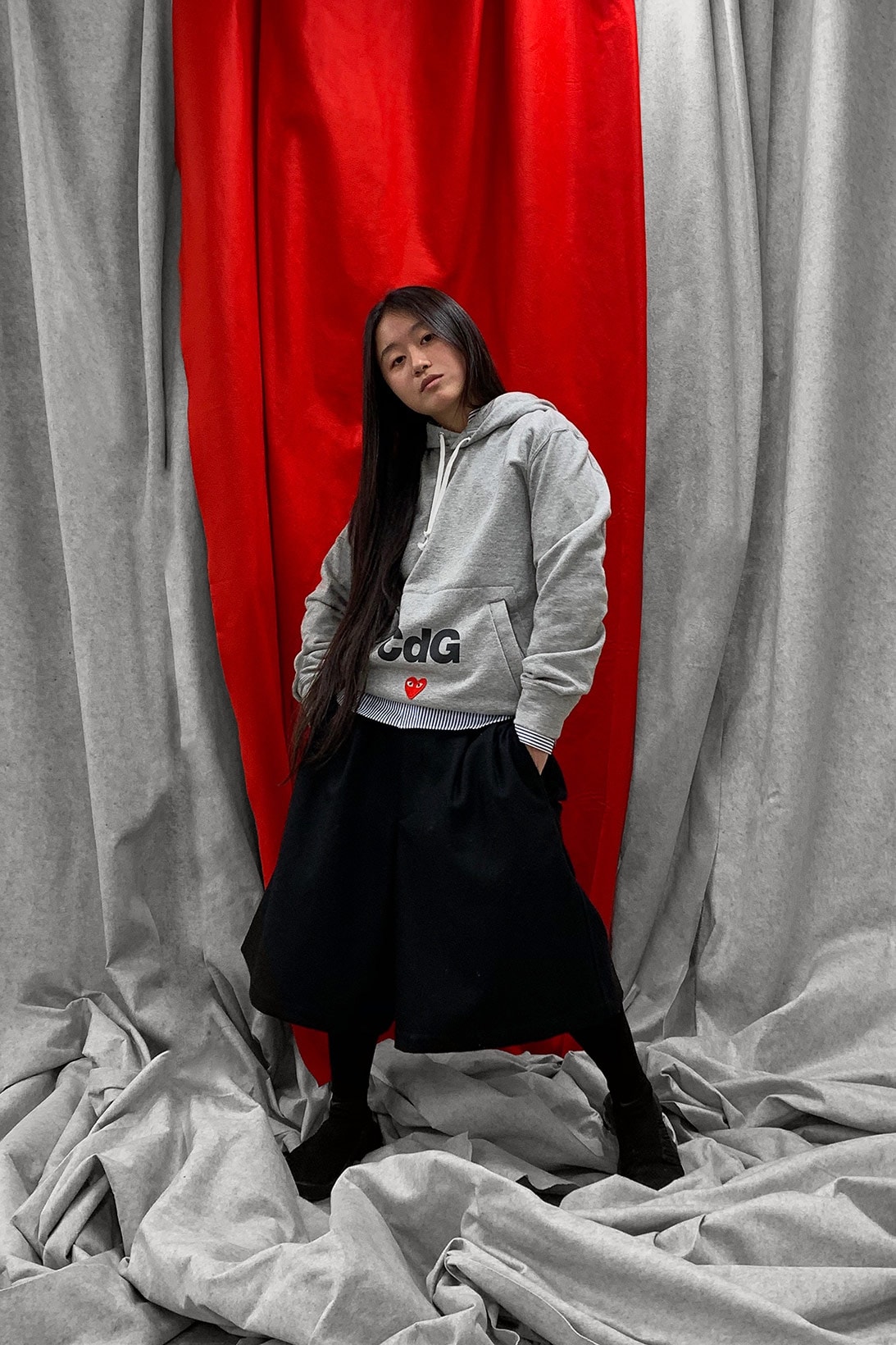 nike converse comme des garcons cdg play together collaboration campaign gray hoodies black skirt