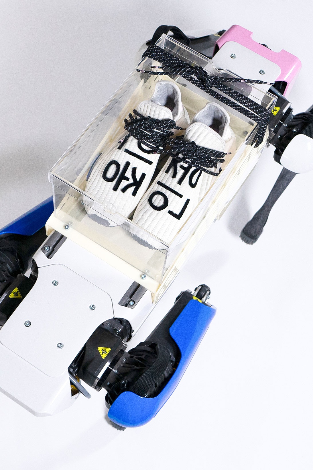 pharrell williams adidas originals hu nmd cream sneakers robot campaign top box korean characters