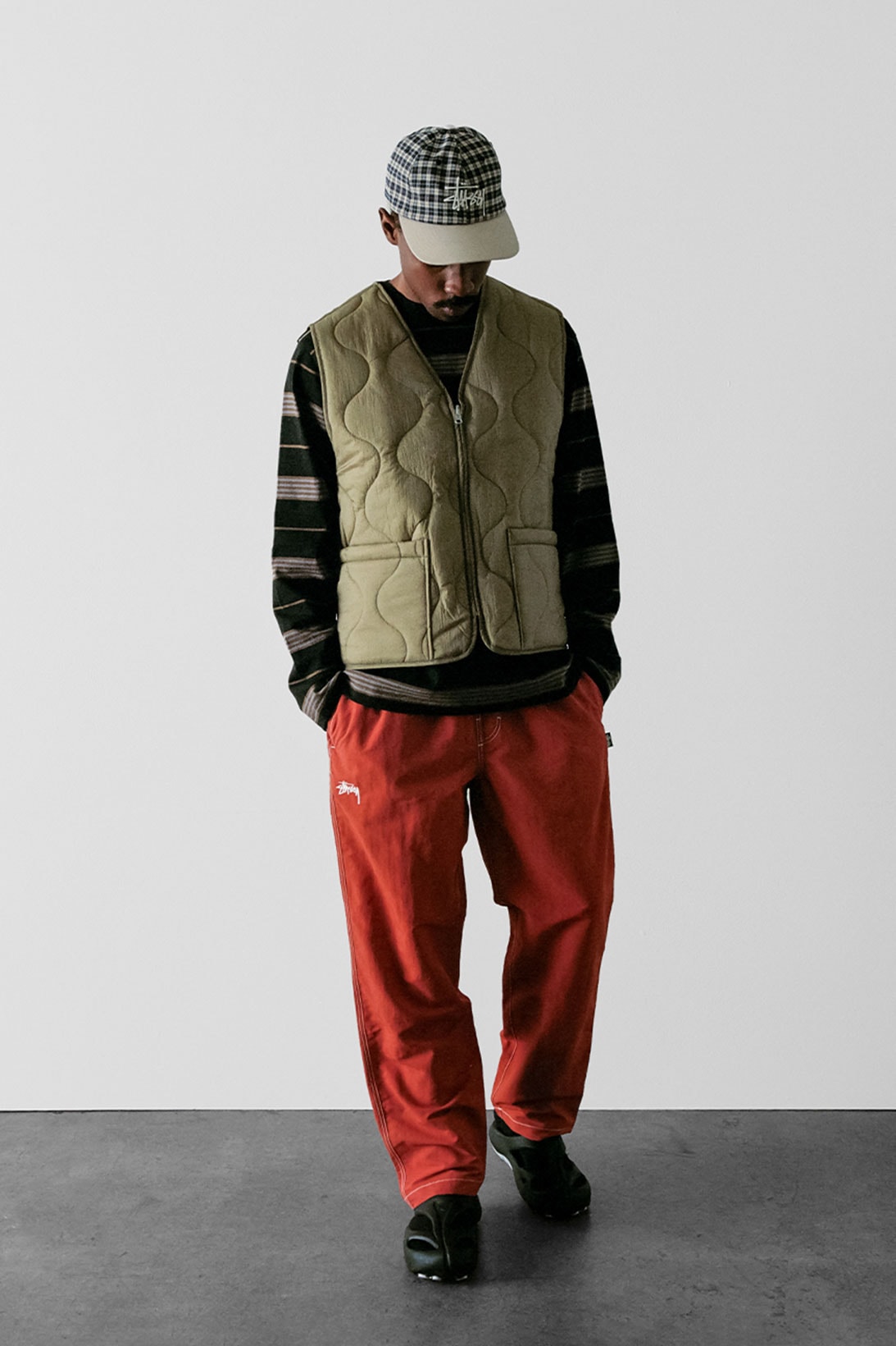 stussy spring 2021 collection lookbook womenswear vest trousers sweater cap