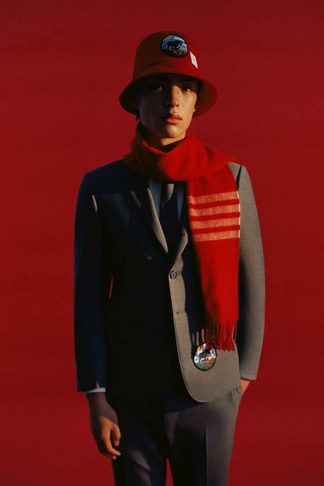 thom browne lunar new year ox capsule collection red bucket hat scarf patch suit menswear