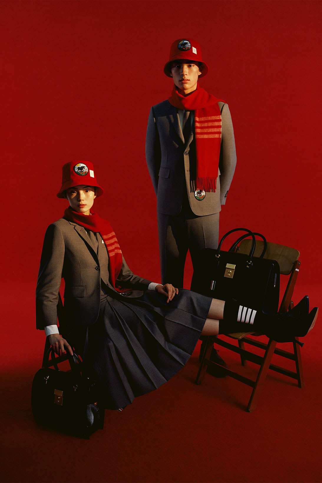 thom browne lunar new year ox capsule collection red bucket hat scarf patch suit menswear xiao wen ju cardigan