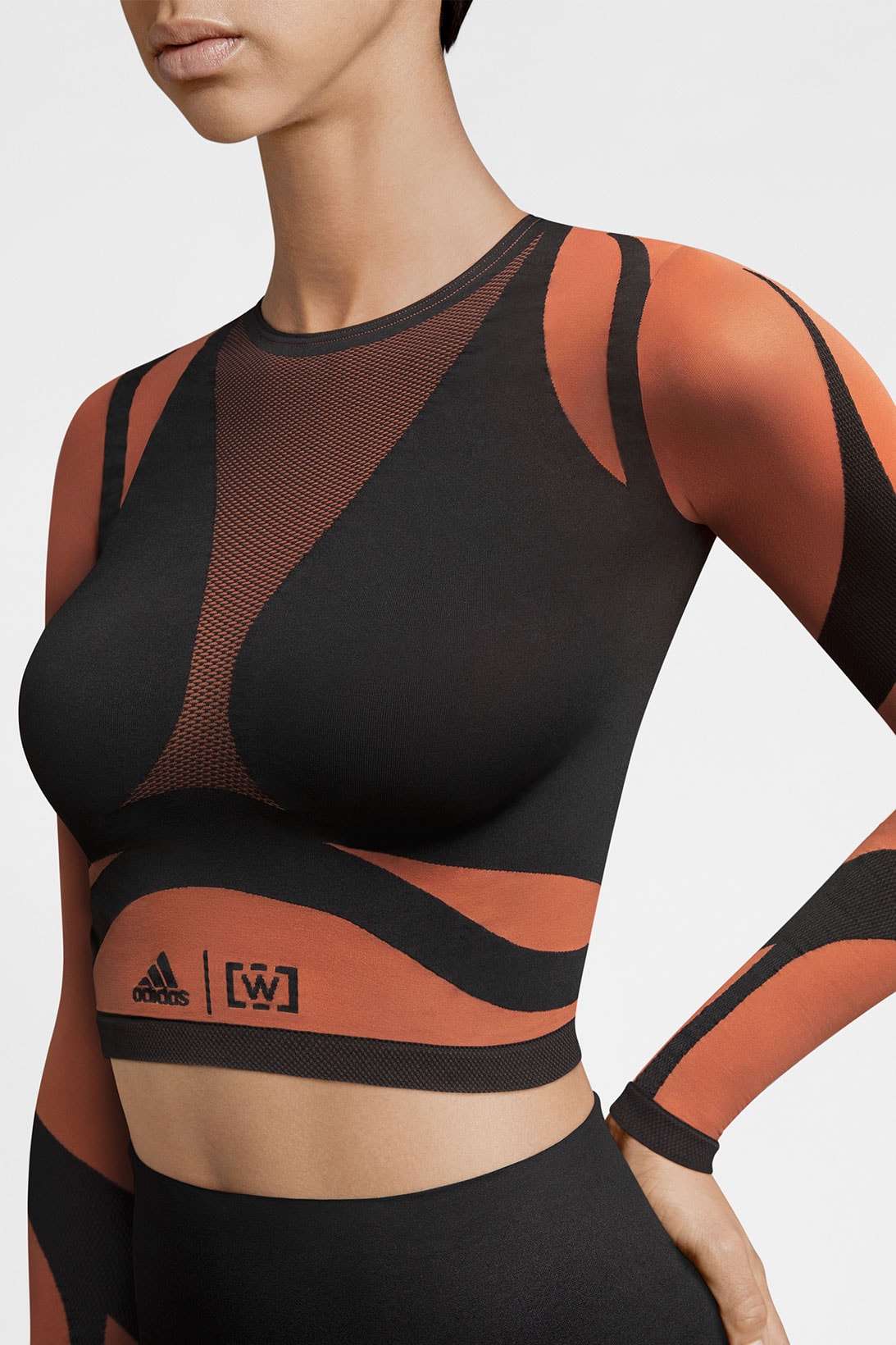 wolford adidas activewear performance collaboration seamless sheer motion crop top long sleeved orange black
