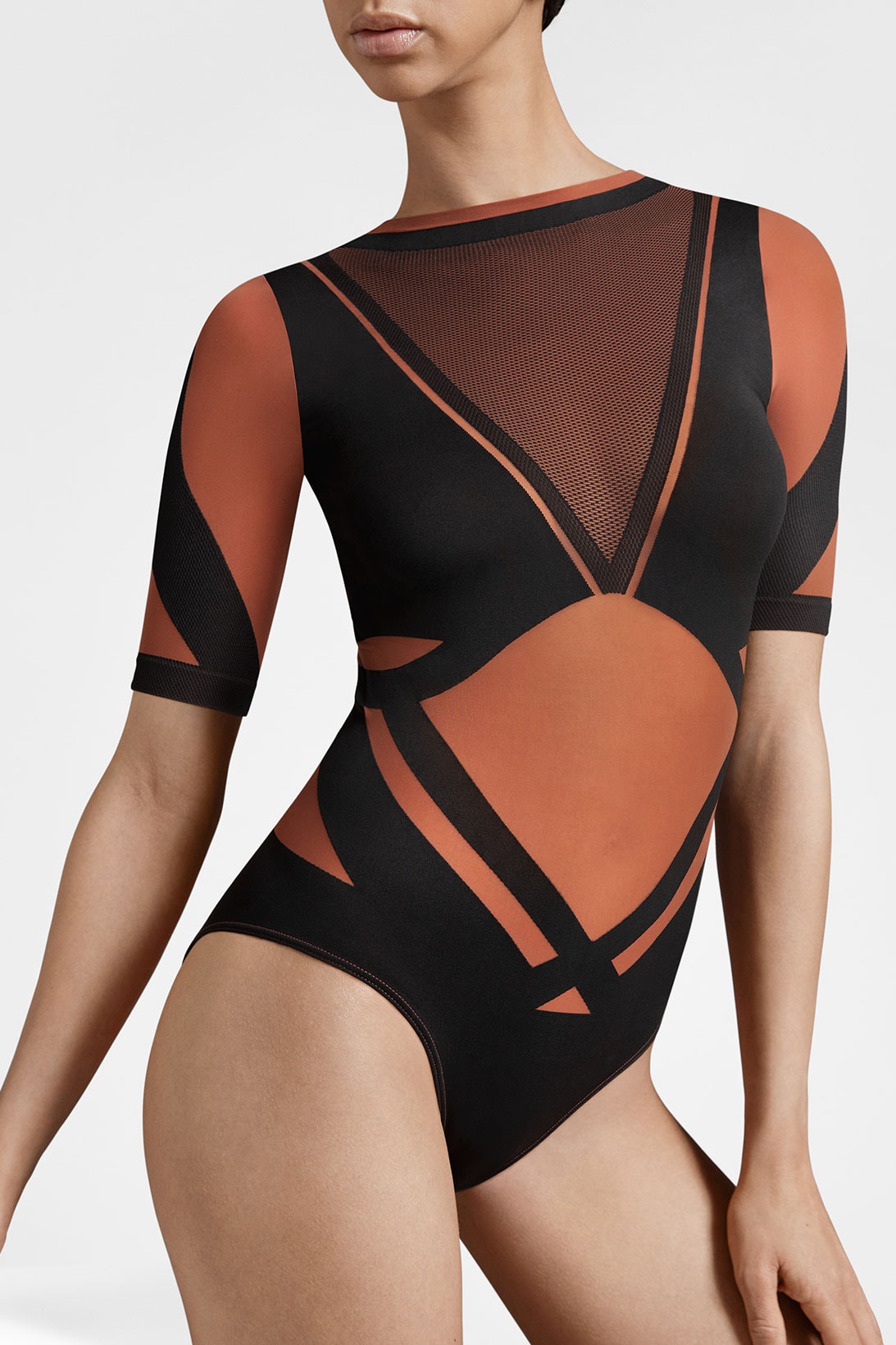 wolford adidas activewear performance collaboration seamless sheer motion orange bodysuit