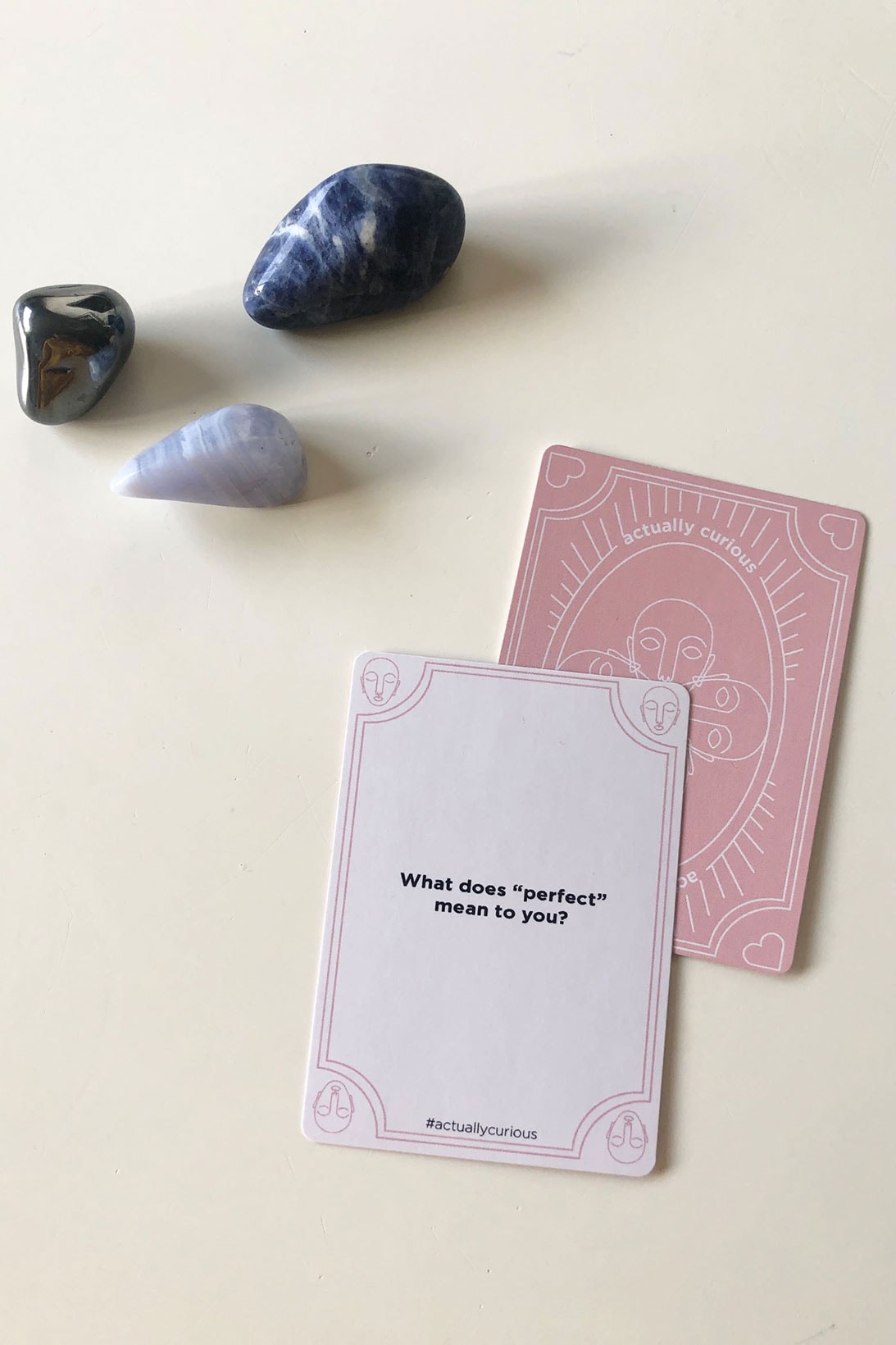 actually curious card game happy hour edition pink healing crystals