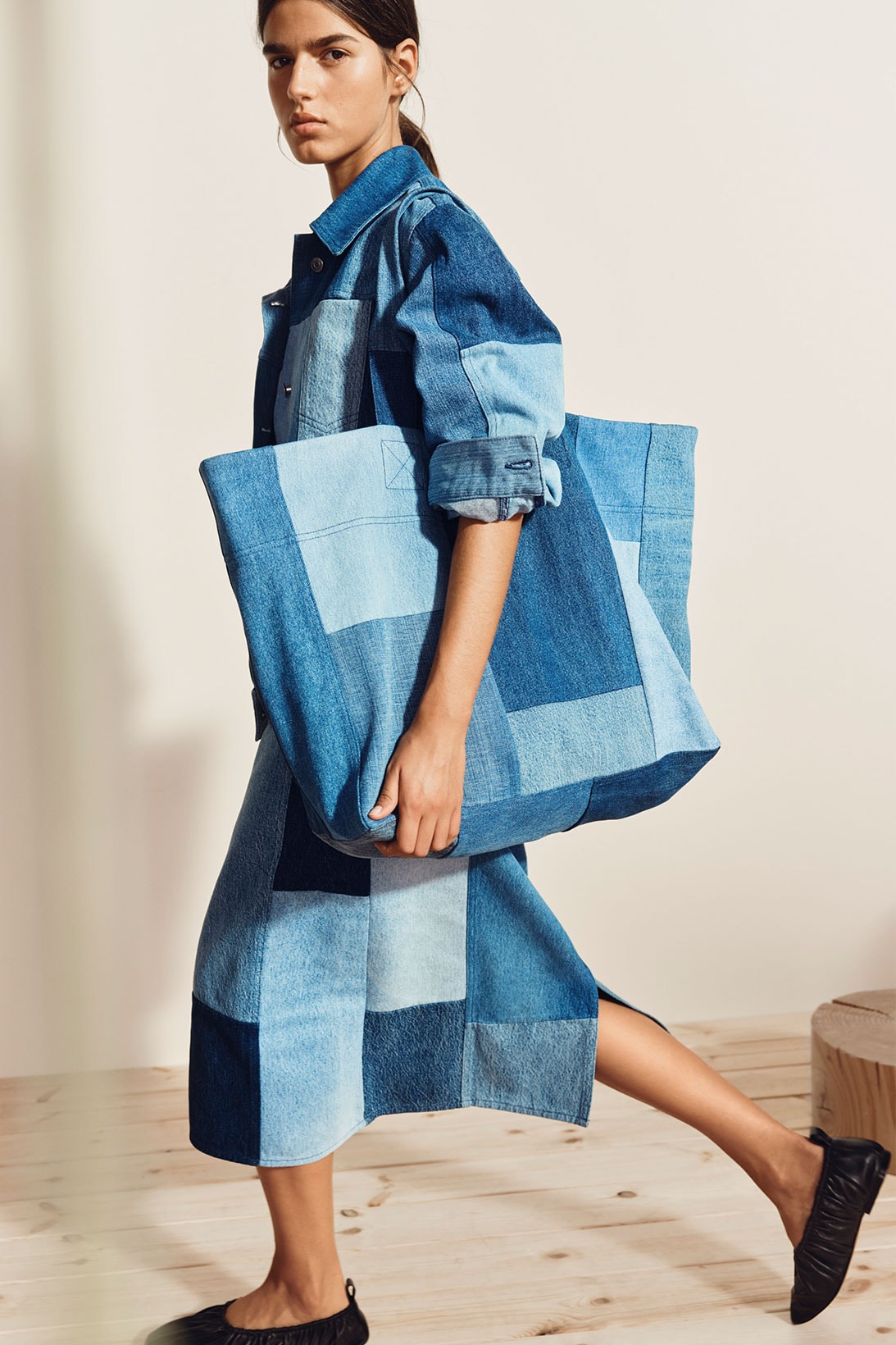 arket patchwork denim sustainable tote bag skirt shirt model walking