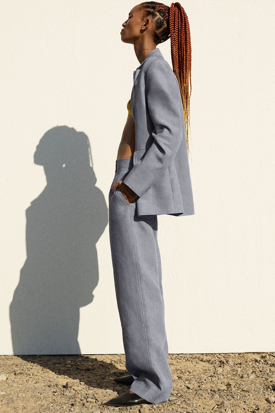 cos spring summer ss21 collection campaign Adesuwa Aighewi grey suit jacket pants