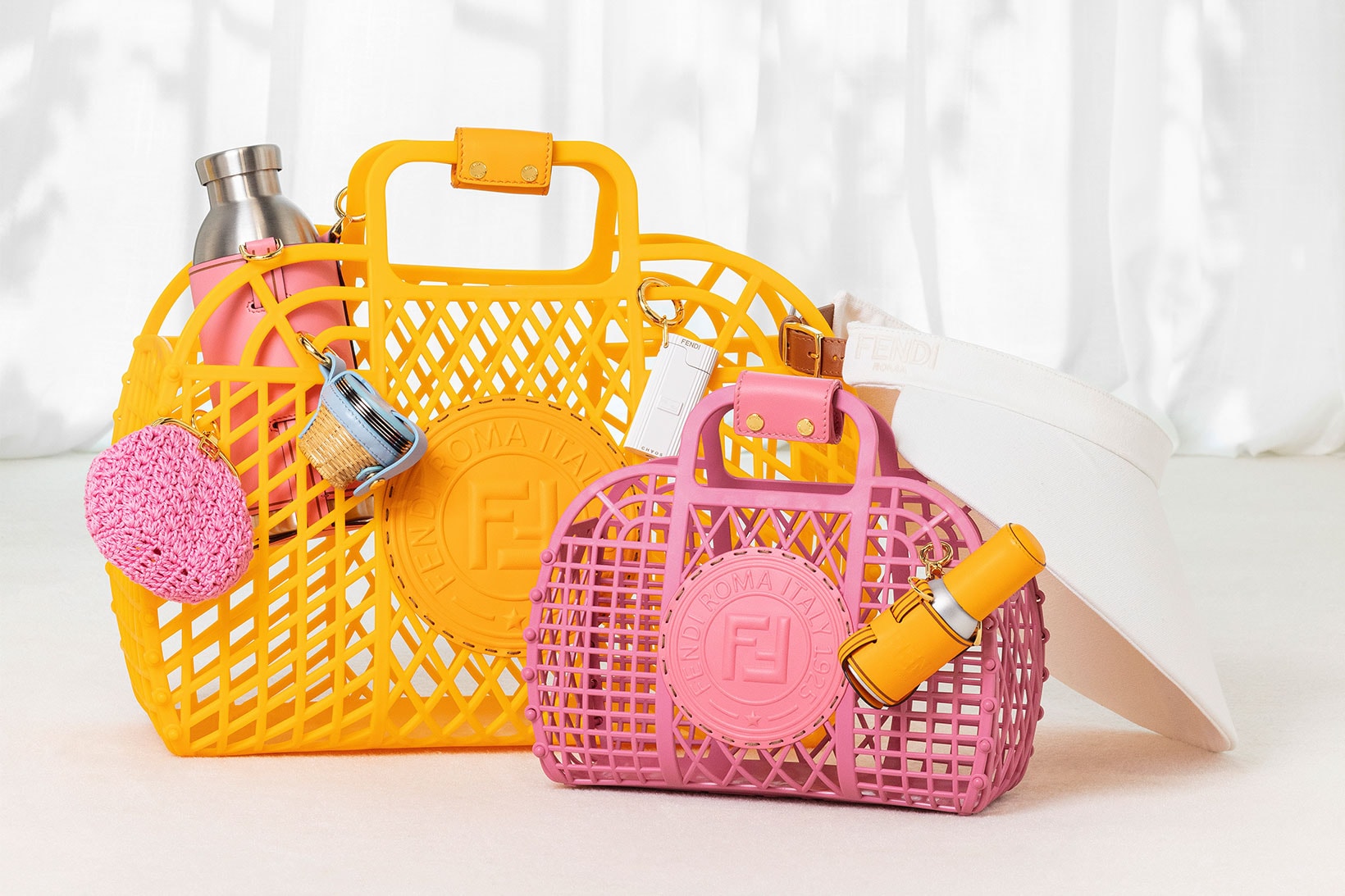 fendi spring summer 2021 ss21 basket handbags recycled pvc yellow pink water bottles