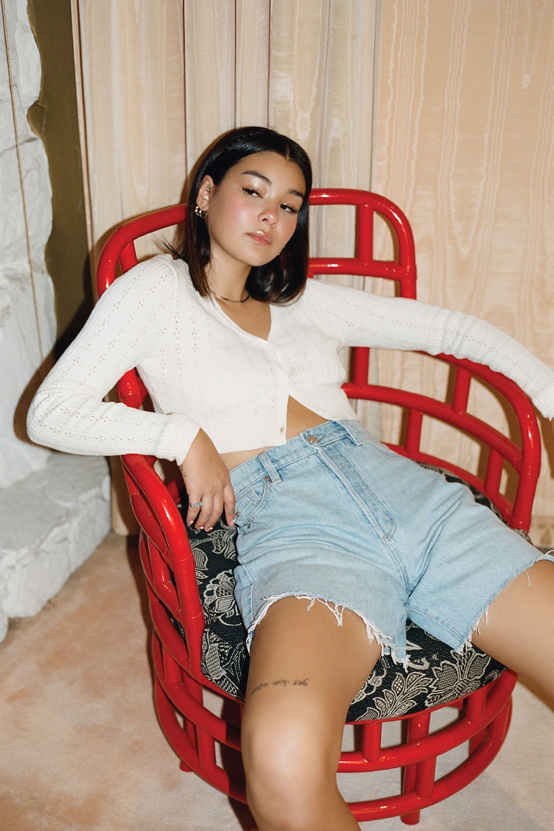 garage spring collection campaign charlotte lawrence sweater denim shorts