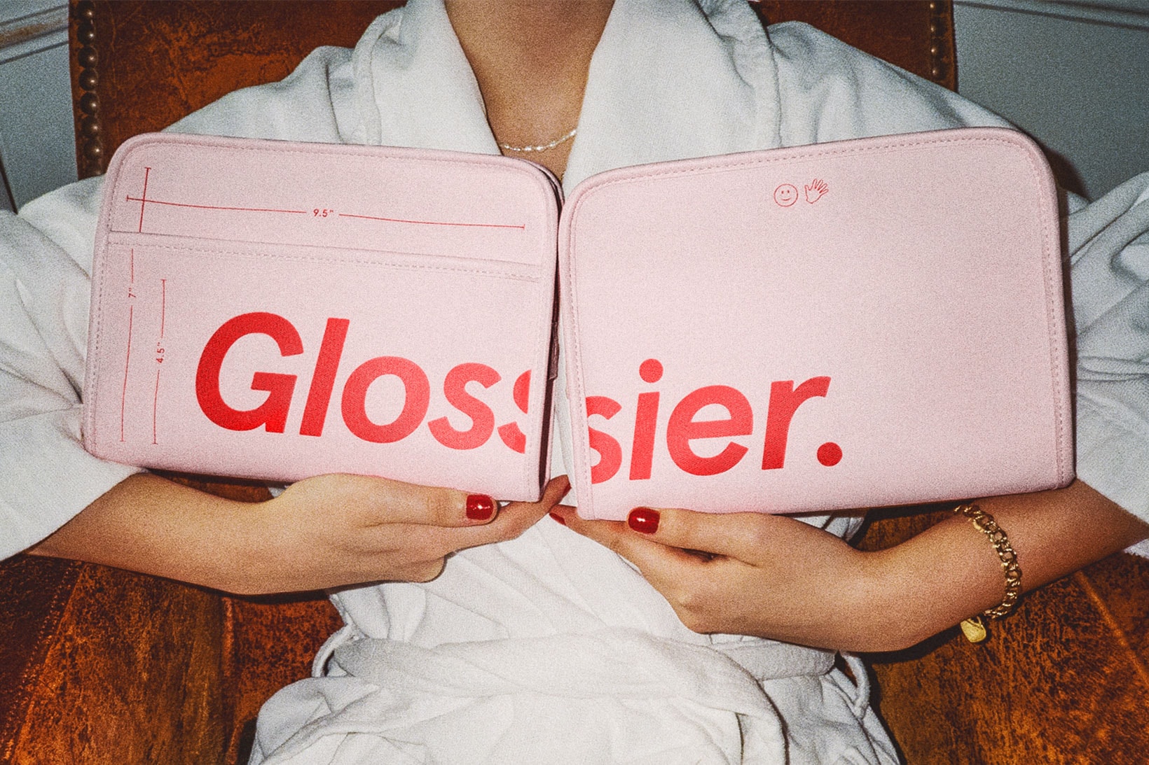 glossier the beauty bag pink red makeup skincare pouch nails shower gown