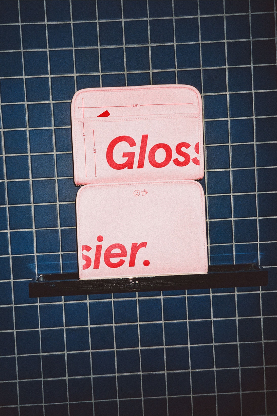 glossier the beauty bag pink red makeup skincare pouch
